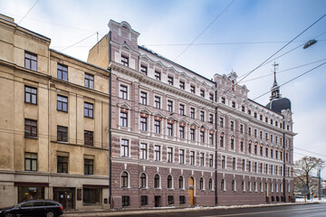 Fototapeta na wymiar Winter cityscape of Riga. Exterior of modern residential building.