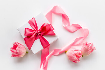 Fift box with pink ribbon. Women mothers day concept