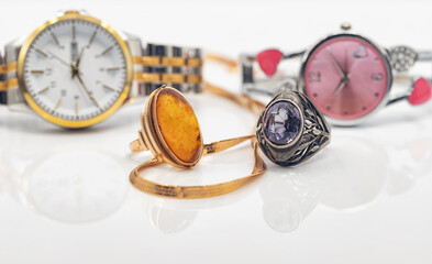 Two sets of accessories for women: different watches and jewelry