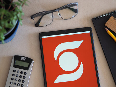 In this photo illustration, ScotiaBank logo seen displayed on a tablet.