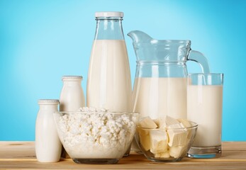 Obraz na płótnie Canvas Milk, yogurt, cheese, butter on light table, variety of dairy products