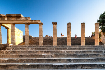 Tourists in Lindos acropolis at Rhodes island in Greece