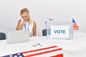 Young caucasian woman at america political campaign election feeling unwell and coughing as symptom for cold or bronchitis. health care concept.