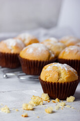 Tasty sweet breakfast, homemade cakes. Freshly baked homemade muffins in brown paper cups.