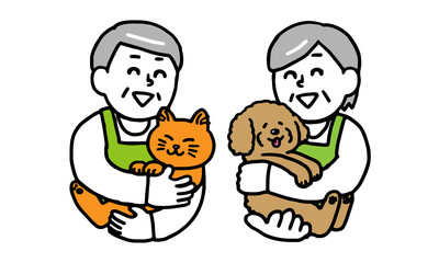 犬と猫を抱っこするエプロン姿のシニア男女