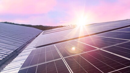 photovoltaic solar panels mounted on building roof for producing clean ecological electricity at...