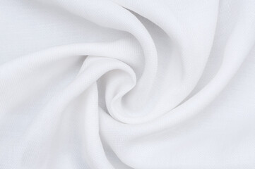 White fabric, soft wave. Pleats in elegant cotton.