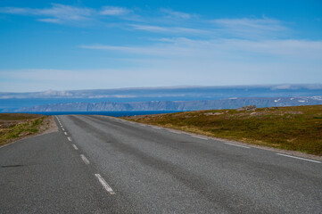 Asphalt road in tundra