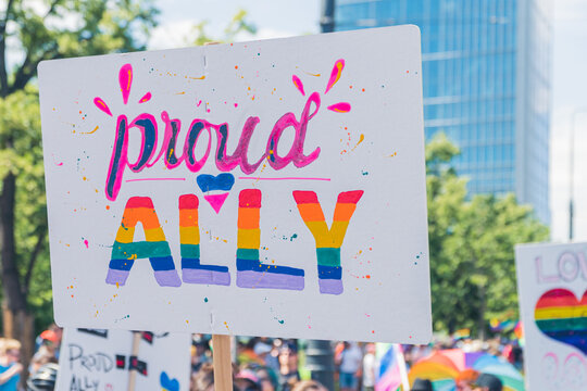 Proud ally. Pride month concept. Colorful homemade cardboard poster showing support for LGBTQAI community. High quality photo