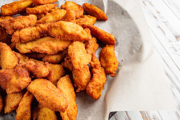 chicken nuggets on a white wooden rustic background