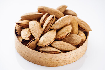 fresh almonds in shell on a white background