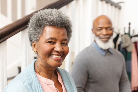 Image of happy african american senior couple at home