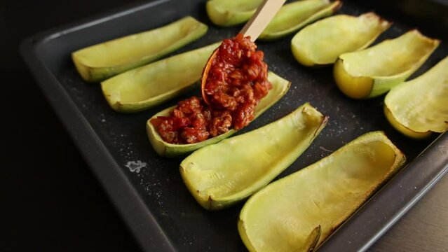 close up stuff zucchini with parmezan cheese  italian dish