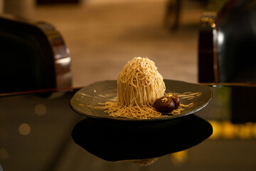 coffee cup on a table モンブラン　ケーキ