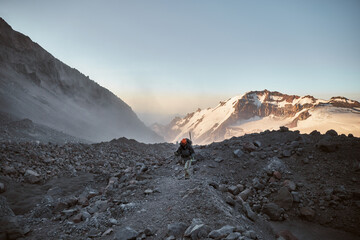 Climbing Kazbek, Georgia. male climder go to the summit.  Nature of Caucasian mountains. Mount Kazbek alpinist expedition