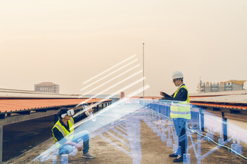 Two Electrical engineer team design solar energy system with hologram technology Virtual reality and Augmented reality for preventing issues occurring installation solar panel at site work.