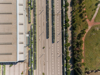Drone view of trains waiting their queue at the train station