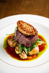 ribeye steak with potato and meat sauce