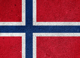 Fototapeta premium State flag of Norway on a plaster wall