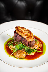 ribeye steak with potato and meat sauce