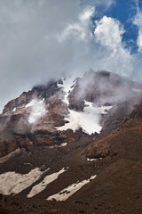 Caucasian mountains. Mt Kazbeg base camp. Meteostation in Kazbek, Georgia. Mount Kazbek alpinist expedition