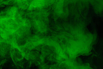Green steam on a black background.