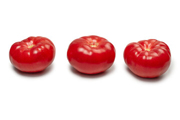 Red fresh tomato isolated on white background.