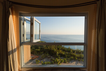 Mediterranean Sea from an open window at the beachside. Vacation, holiday concept