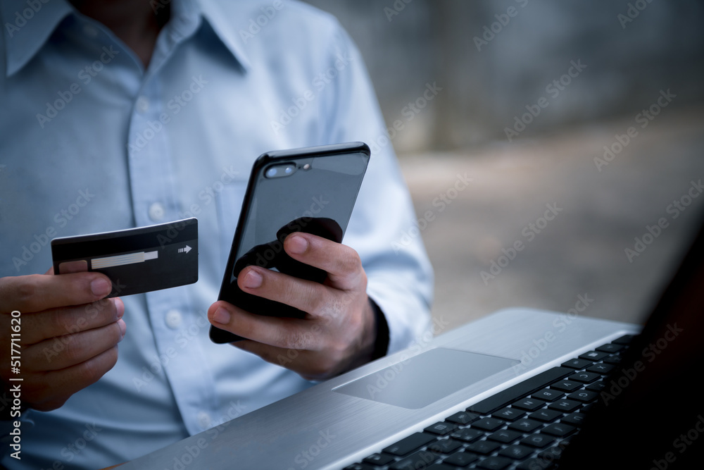 Poster man using credit card via internet banking apps on mobile phone for online shopping and digital paym