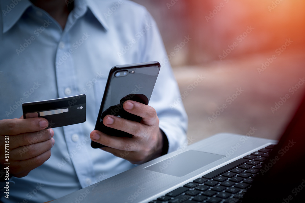 Poster man using credit card via internet banking apps on mobile phone for online shopping and digital paym