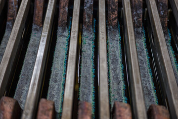 Closeup view of anodes with copper sulfate crystals.