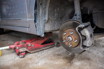 Car disk brake repair in garage