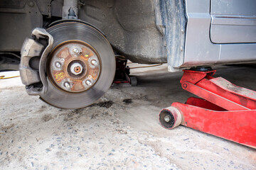 Car disk brake repair in garage