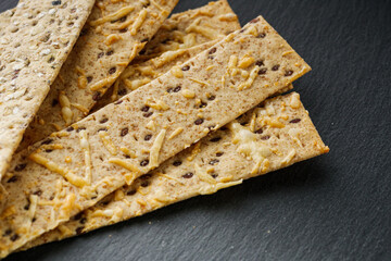 diet crispy bread on a black stone background