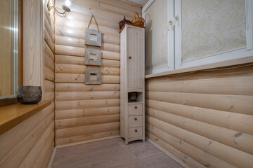 interior of a living room with wooden elements in a rustic eco style
