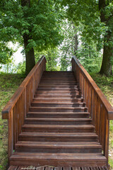 Fototapeta premium Wooden stairs in the park