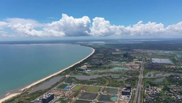 Aerial Video of Haikou City Jiangdong New District, an International Hub for Retail, Residential, Leisure, Workplace, and Transportation in Hainan Free Trade Zone, Hainan Province, China, Asia.