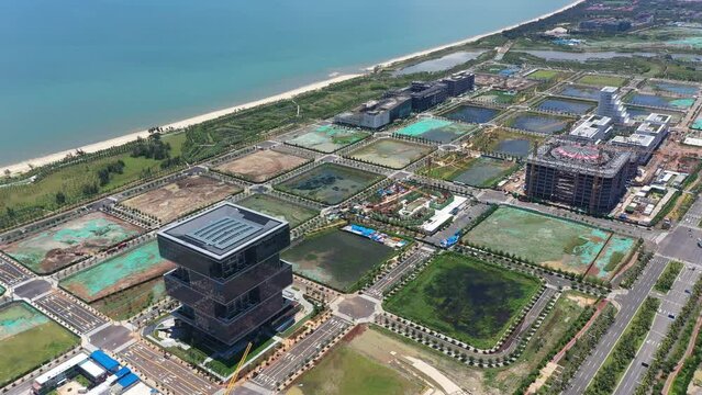 Aerial Video of Haikou City Jiangdong New District, an International Hub for Retail, Residential, Leisure, Workplace, and Transportation in Hainan Free Trade Zone, Hainan Province, China, Asia.