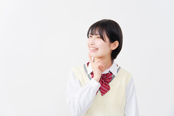 笑顔で想像する女子高生　白背景