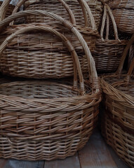 Traditional handicraft. Woven baskets with braided handles 