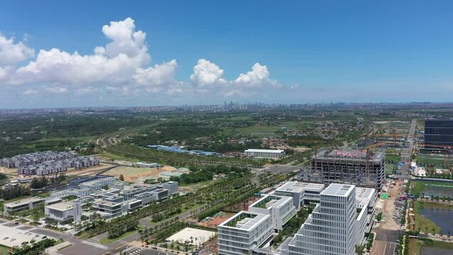 Aerial Video of Haikou City Jiangdong New District, an International Hub for Retail, Residential, Leisure, Workplace, and Transportation in Hainan Free Trade Zone, Hainan Province, China, Asia.