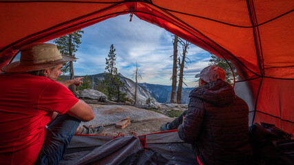Two hikers inside a tent in Yosemite National Park California