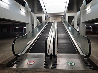 Empty double escalator inside the building