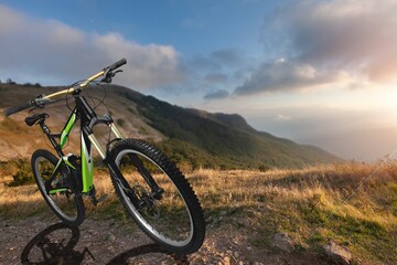 Fototapeta na wymiar beautiful landscape with Bicycle at sunrise, world bicycle day,
