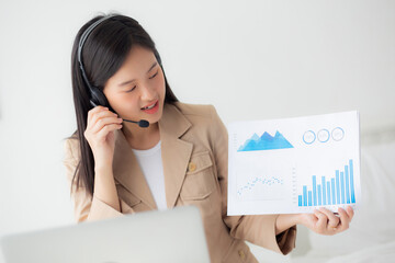 Young asian business woman using laptop computer for video conference online, businesswoman working...