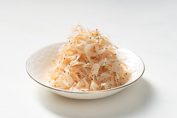 Seafood condiment dried shrimp skin on solid color background
