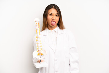 asian young woman feeling disgusted and irritated and tongue out. spnie physician student concept