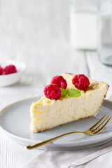 Piece of cheesecake with berries, copy space