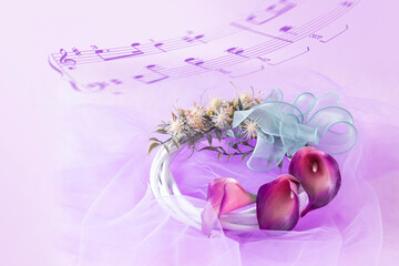 美しいボルドー色のカラーリリー(Calla lily)のリースと楽譜の合成（紫色のチュールの背景）