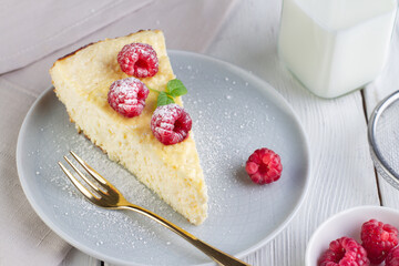 Cheesecake with raspberries on a plate